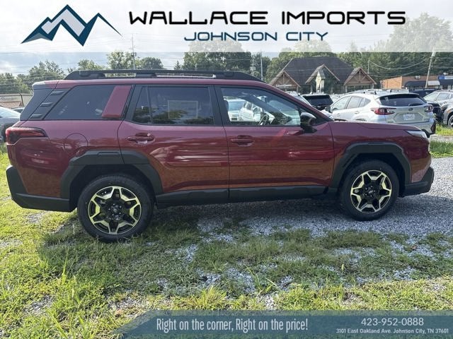 2026 Subaru OUTBACK Touring in Crimson Red Pearl — front three-quarter view