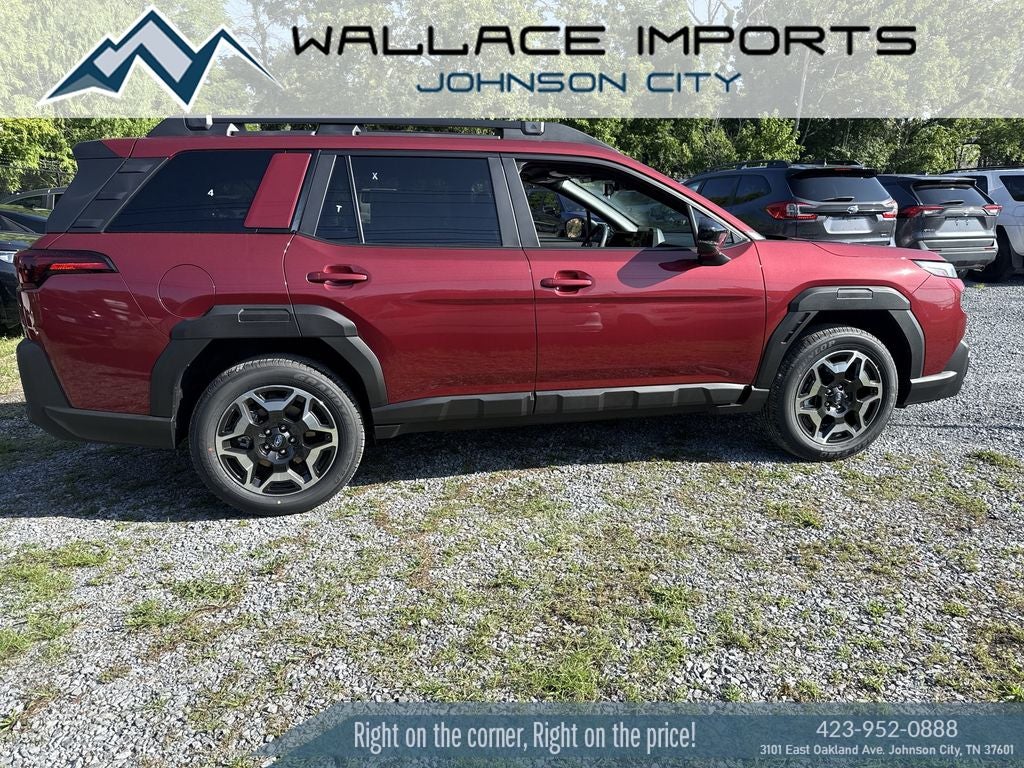 2026 Subaru OUTBACK Touring in Crimson Red Pearl — front three-quarter view