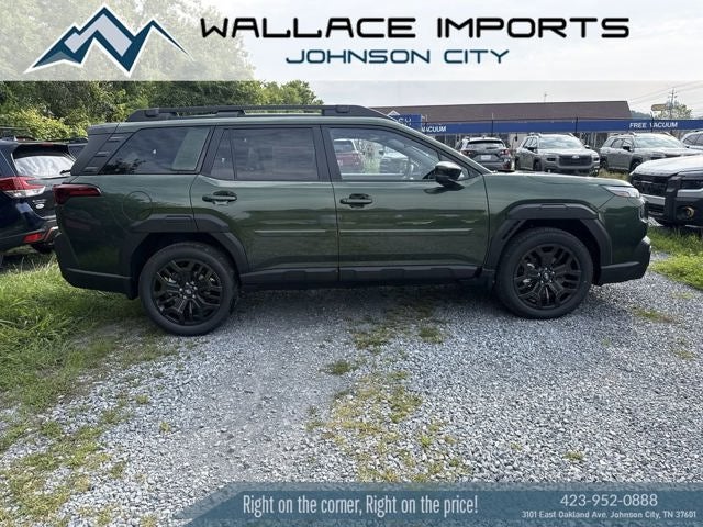 2026 Subaru OUTBACK Limited XT in Deep Emerald Green Pearl — front three-quarter view
