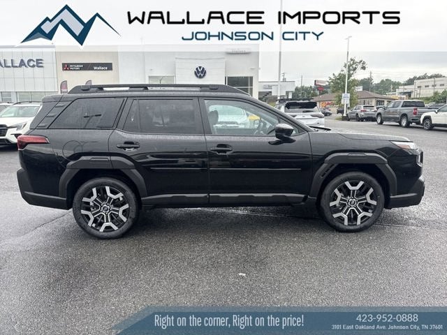 2026 Subaru OUTBACK Touring XT in Crystal Black Silica — front three-quarter view