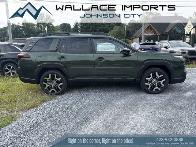 2026 Subaru OUTBACK Touring XT in Deep Emerald Green Pearl — front three-quarter view