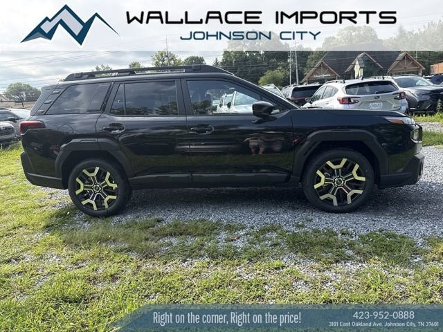 2026 Subaru OUTBACK Touring XT in Crystal Black Silica — front three-quarter view