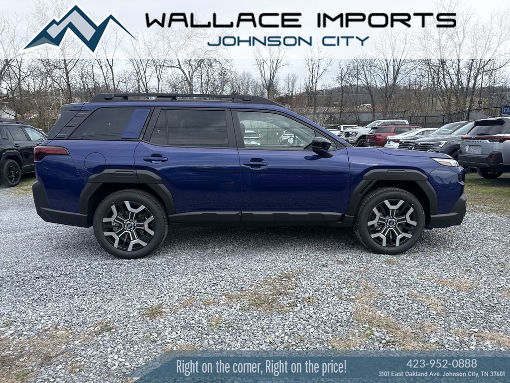 2026 Subaru OUTBACK Touring XT in Sapphire Blue Pearl — front three-quarter view