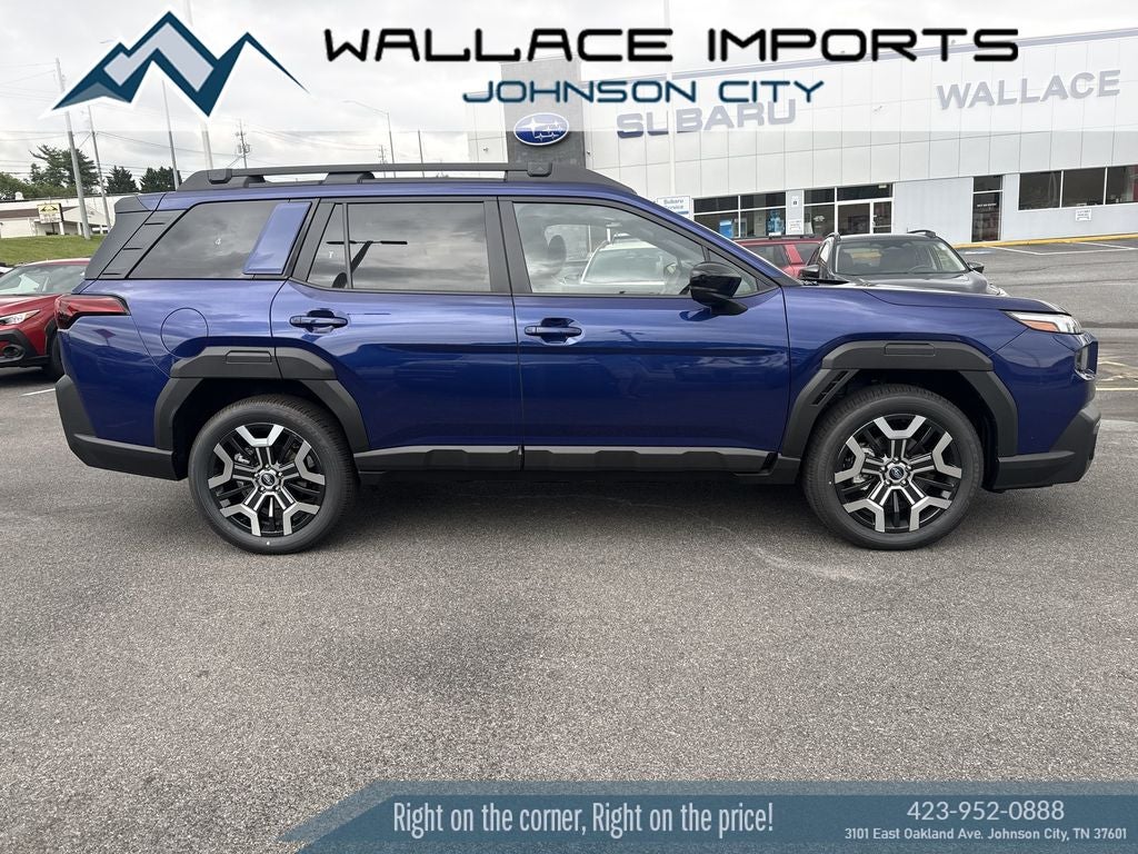 2026 Subaru OUTBACK Touring XT in Sapphire Blue Pearl — front three-quarter view