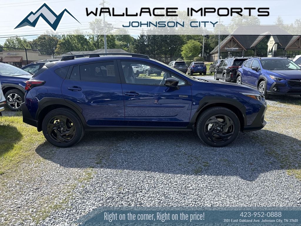 2026 Subaru CROSSTREK Sport Hybrid in Sapphire Blue Pearl — front three-quarter view