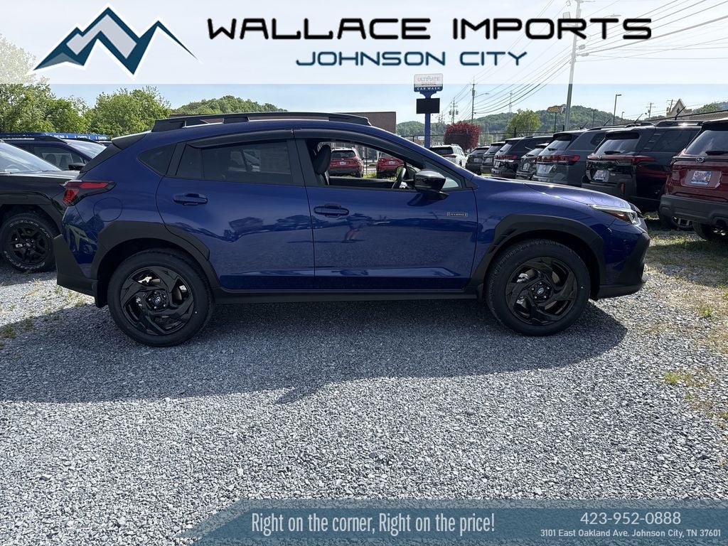 2026 Subaru CROSSTREK Sport Hybrid in Sapphire Blue Pearl — front three-quarter view
