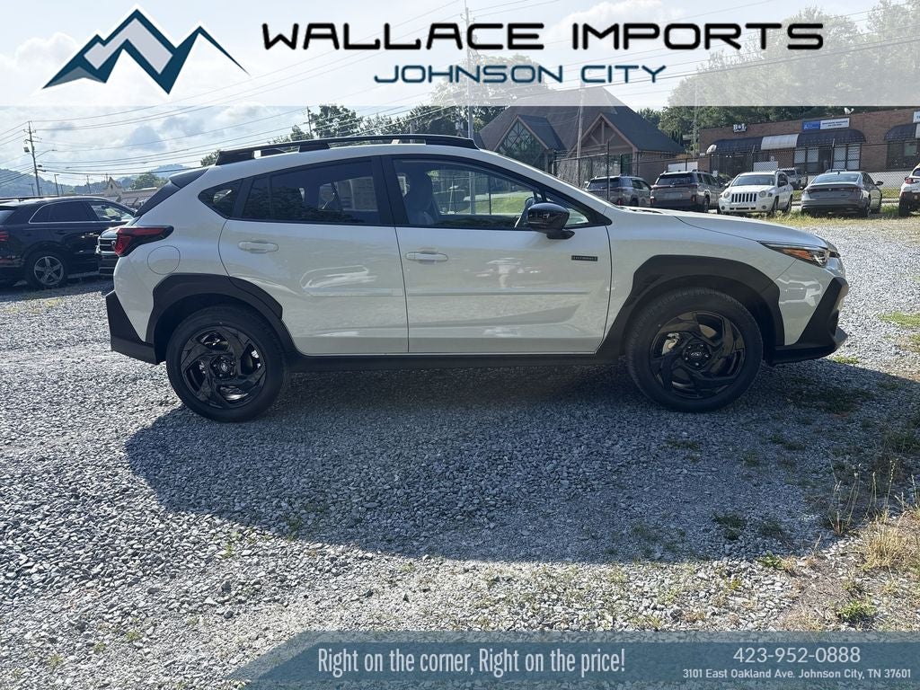 2026 Subaru CROSSTREK Sport Hybrid in Crystal White Pearl — front three-quarter view