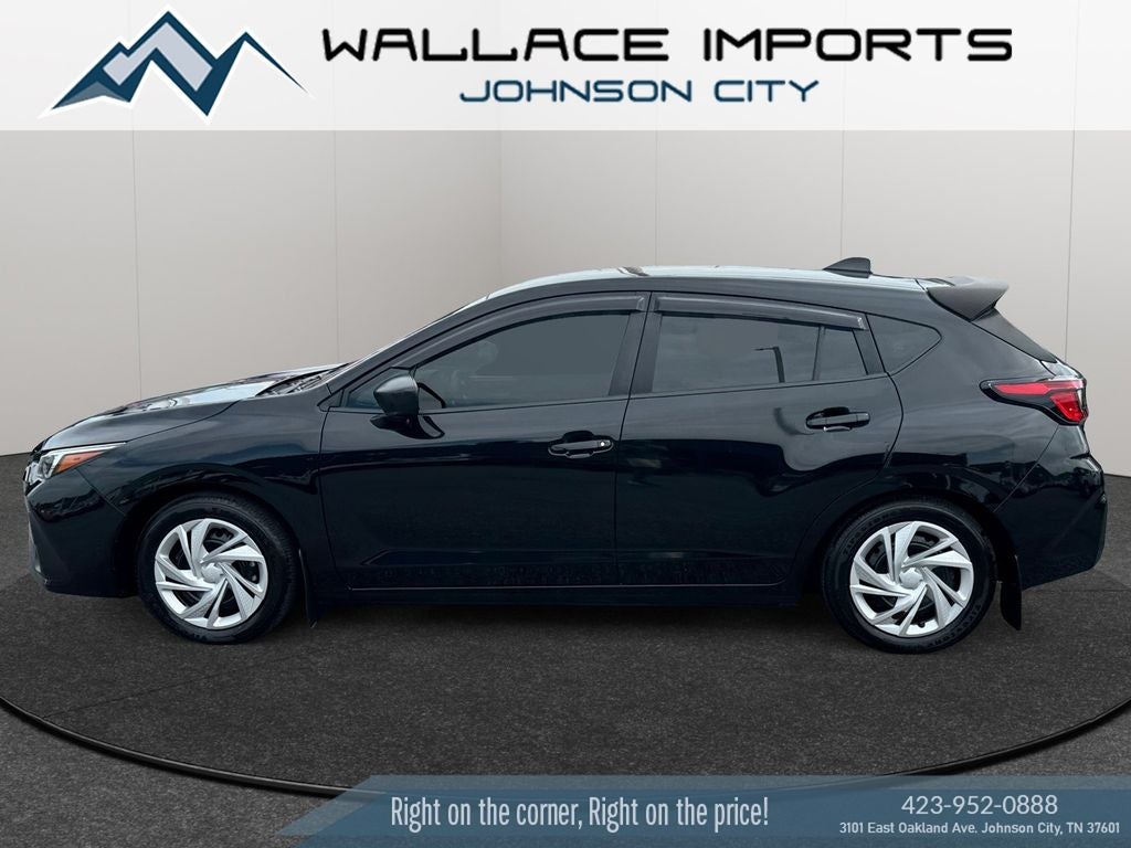2024 Subaru Impreza Base in Crystal Black Silica — front three-quarter view
