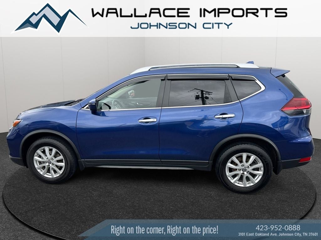 2020 Nissan Rogue S in Caspian Blue Metallic — front three-quarter view