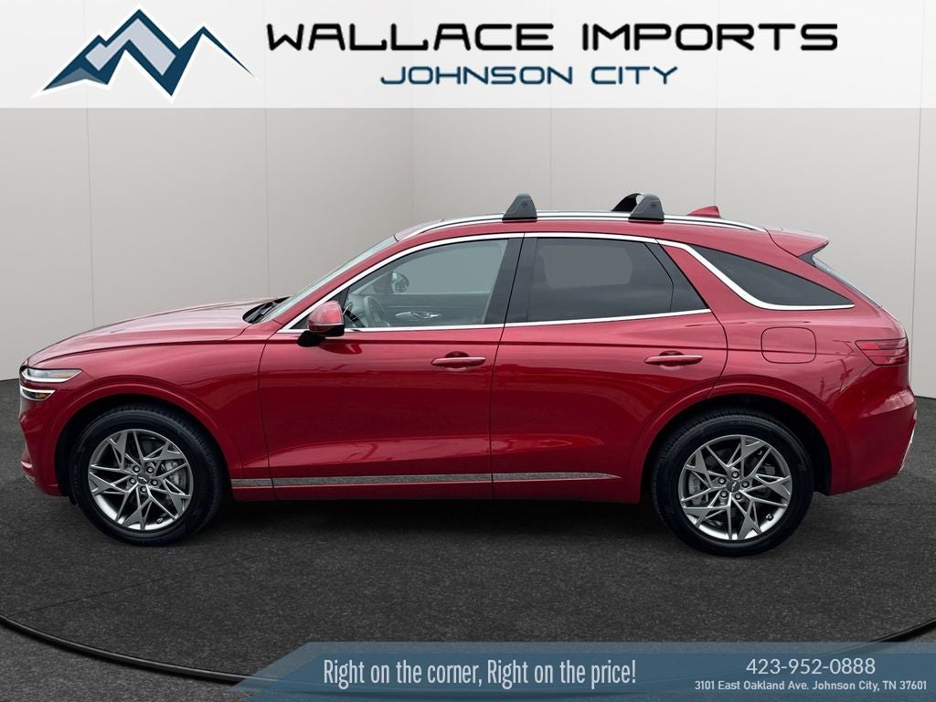 2023 Genesis GV70 2.5T in Mauna Red — front three-quarter view